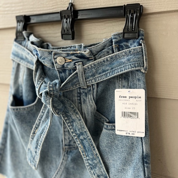 New with tags. Free People East of Eden Belted Denim Frayed Mini Skirt - Picture 4 of 4